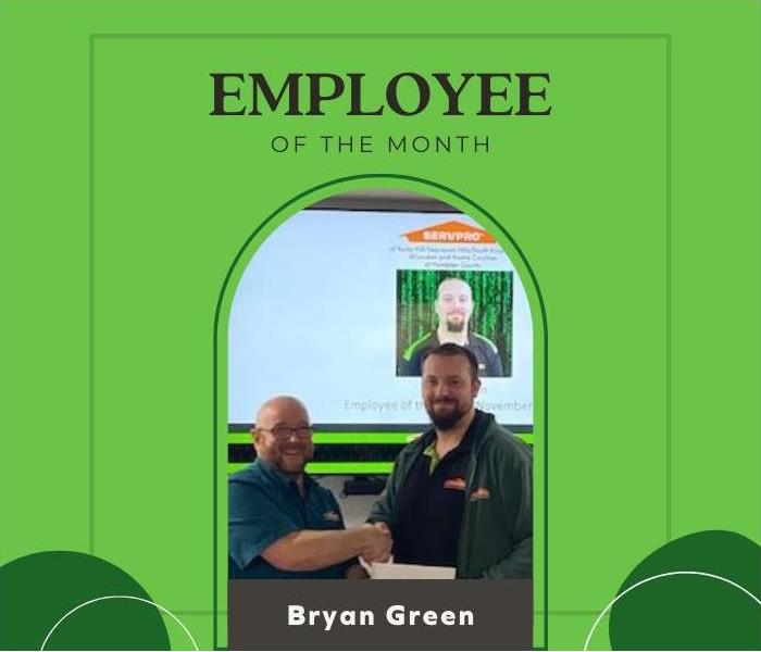 two employees shaking hands on a green Employee of the month background