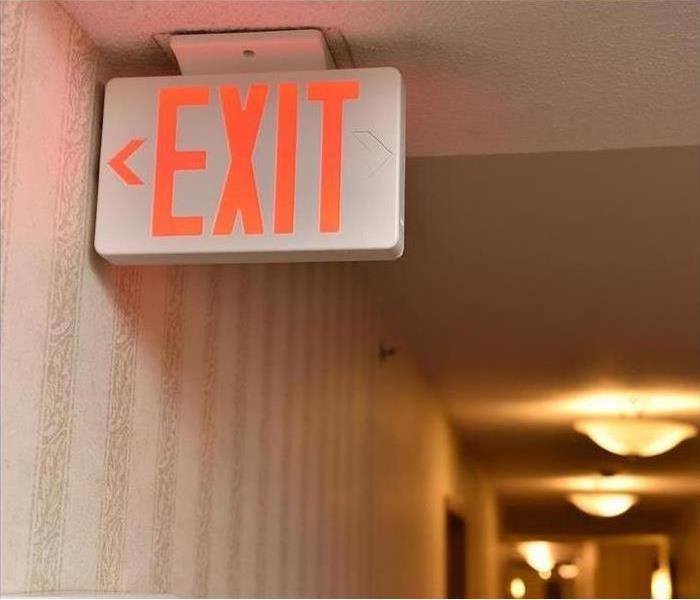 exit sign in office after water mishap
