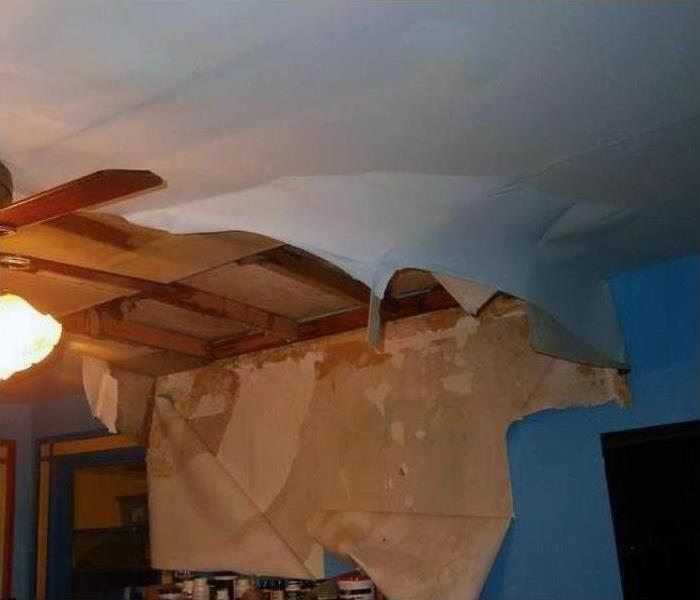 A roof caving in after a storm hit this home